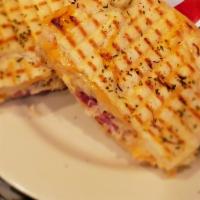 Reuben Panini Lunch · Corned beef, sauerkraut melted Swiss cheese, and Russian dressing. Served with chips, pasta ...