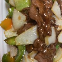 C10. Pepper Steak with Onion Combo · Stir fried steak with vegetables and a savory sauce.