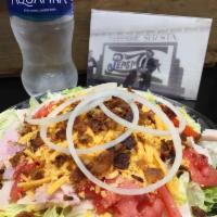 Chef Salad · Comes with turkey breast, city ham, country bacon, tomatoes, ring onion on a bed of iceberg ...