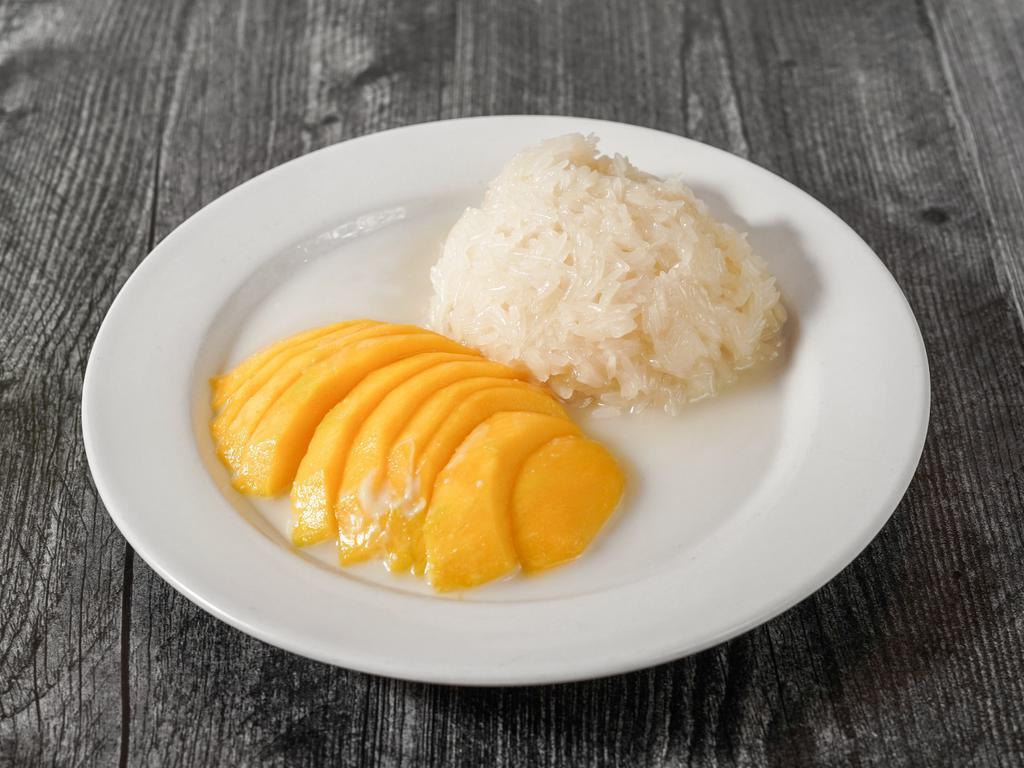 Sticky rice with mango  · Sweet rice with coconut milk tops with mango
