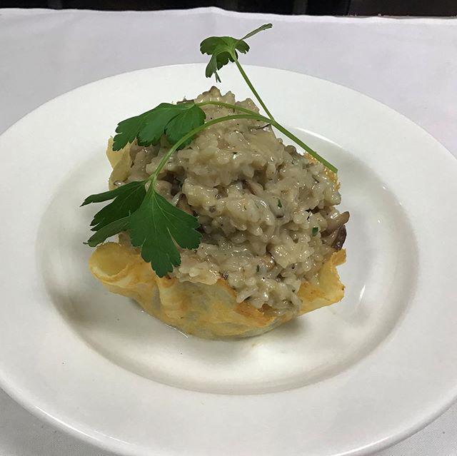 Risotto Mix Mushrooms · Risotto with Porcini Mushrooms, wwild Mushrooms, touch of black truffle and served in a cheese basquet.