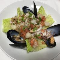 Insalata di Mare · Seafood salad in a lemon vinaigrette.