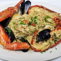 Lobster Seafood pasta · Whole Lobster seafood pasta, With Shirmp, Mussels and scallops in a white wine garlic and sh...