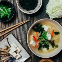 Gluten-Free Miso Soup · Tofu, wakame, scallions, carrot and napa.