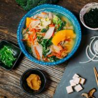Earthy Miso Soup Bowl · Shiitake, tofu, napa, carrot, onion, wakame, kabocha, greens, broccoli, ginger and scallions...