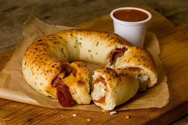 Rip and Dip Pizza Ring · Cheese and pepperoni filled ring with a side of marinara.