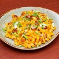 Cajun Macaroni & Cheese · Chicken breast, Andouille sausage, spicy cheese sauce. Add blackened shrimp for an additiona...