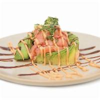 Tuna Tartare Dome · Tuna tartare wrapped in avocado slices and drizzled with spicy mayo & eel sauce