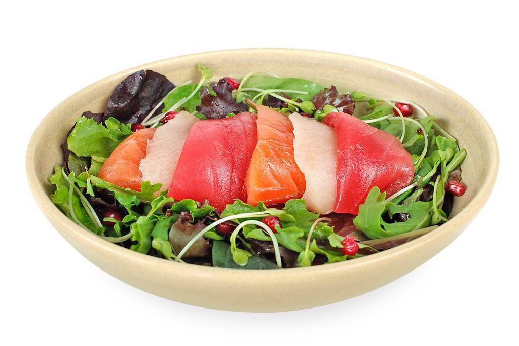 Sashimi Salad · Assorted sashimi with mixed greens, pomegranate and sweet & sour soy dressing