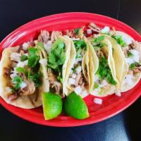 Carnitas Taco · 3 Pork tacos 
