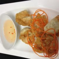 Dinner Crab Cheese Wonton · Crab meat mixed with cream cheese wrapped with wonton skin and deep fried.
