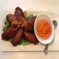 Dinner Chicken Wing · Deep fried chicken wings with homemade chili sauce.