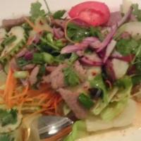 Dinner Beef Salad · Grilled beef, tomato, cucumber, red onion, cilantro and mint mixed in lime vinaigrette dress...