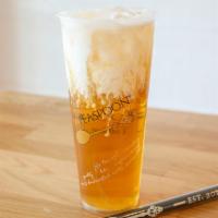 Liquid Gold · Handcrafted honey oolong tea topped with cream.