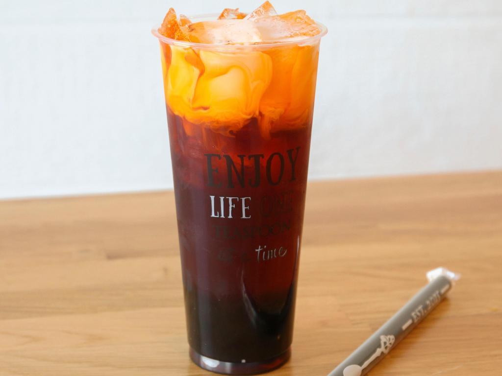 Classic Thai Tea · Sweet Thai tea topped with organic cream. Comes with boba. cannot change sugar level