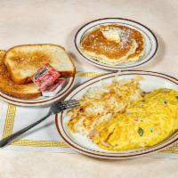 Plain Omelette · A plain 3-egg omelette with potatoes and side of toast or pancake. 