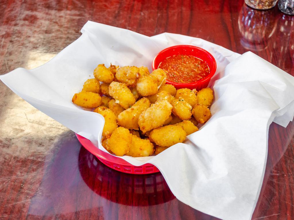 Cheese Curds · Served with marinara or ranch.