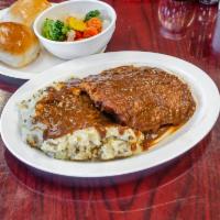 Chicken Fried Steak · Premium Angus beefsteak, battered, and deep-fried to perfection. Served topped with Homemade...