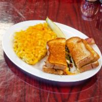 The Pueblo Popper Club · Jalapenos, cream cheese bacon, sharp cheddar on triple-layered buttery grilled white bread.