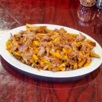 Pulled Pork Fries · Home cut fries served with BBQ pulled pork, purple onion, and our cheddar cheese.