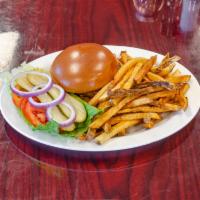 Classic Burger · Our not so basic burger is topped with lettuce, tomato, and purple onions. Served on a brioc...