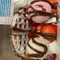 Strawberry Banana  Ice Cream Sandwich · Waffle topped with 2 scoops of ice cream, banana, strawberry, chocolate syrup and whipped cr...
