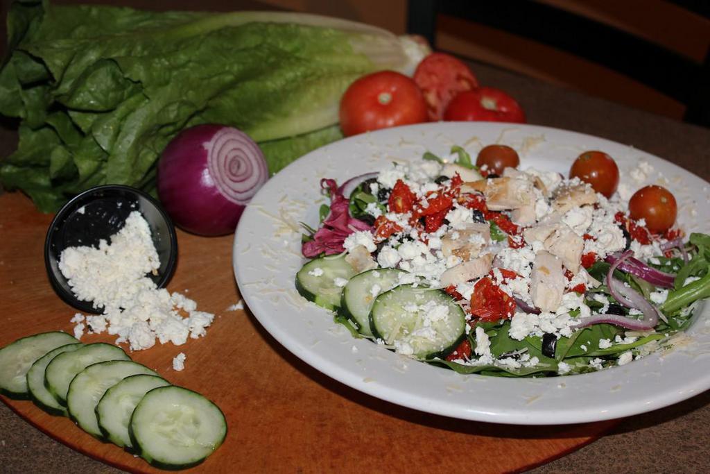 Mediterranean Salad · Romaine and spring mix topped with brick fired chicken, cherry tomatoes, cucumbers, red onions, olives, sun dried tomatoes, feta cheese and gourmet 3 cheese blend. Served with balsamic vinaigrette dressing.