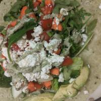 Mediterranean Chicken Wrap · Grilled chicken, romaine, red onion, tomatoes, Kalamata olives, feta cheese, hummus and basi...