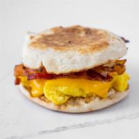English Muffin Breakfast Sandwich · Bacon or sausage, egg and american cheese