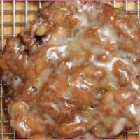 One dozen fresh apple fritters · Each fritter is packed with an abundance of fresh apples in a cinnamon & brown sugar base to...