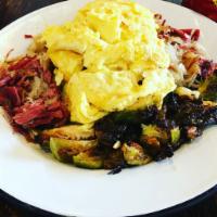 Corned Beef Hash · BOLT-made corned beef, hash browned potatoes, Brussels sprouts and 2 eggs.