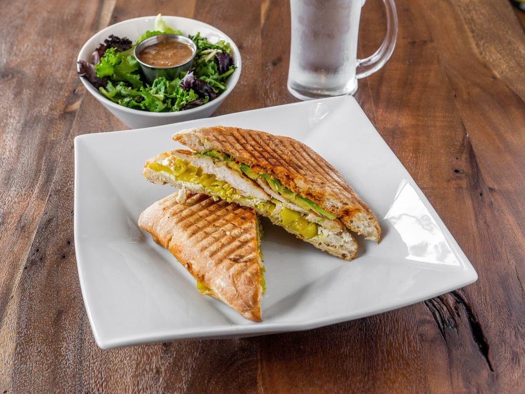 Chipotle Chicken Panini · Grilled chicken, avocado, tomatoes, lettuce and chipotle sauce on ciabatta bread with a bag of kettle chips.