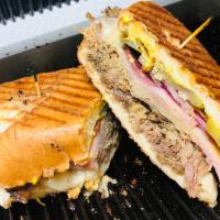 6. Cubano Sandwich with Fries · Ham and cheese sandwich. 