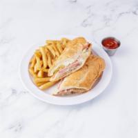 Cubano Sandwich · Cuban. Served with french fries or a side salad.