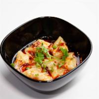Spicy Wonton · Homemade Berkshire pork wonton topped with a combination of sweet soy sauce, garlic, roasted...