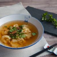 Bresse Wontons  · Bresse chicken broth stewed for 8 hours with home-made wontons stuffed with Berkshire pork f...