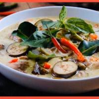 18. Green Curry · Bamboo shoots,Eggplants,Bell peppers &Basil (Served with Jasmine rice)