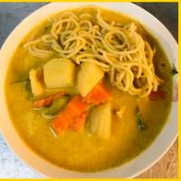 11. Sky Noodle Curry · Steamed rice noodles, steamed mixed vegetables, and peanut curry sauce.