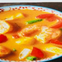 Penang Curry · Red curry cooked incoconut milk with bell pepper ,green bean ,Mushroom,Kaffir lime leaves&Ba...