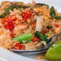 12. Thai Fried Rice · Fried rice with egg. onion, tomato, green onion, Chinese broccoli, and sweet soy sauce.