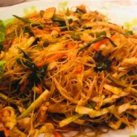 Singapore Rice Noodles · Rice noodles,Bell pepper ,Carrot,Green onion ,Bean sprout, Cabbage and Sweet soy sauce.