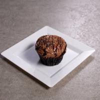 Choco-holic Cupcake · Chocolate cake with chocolate buttercream topped with chocolate sprinkles.