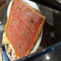 Tomato pie Pan Pizza · No cheese, just thin pan crust and our homemade sauce