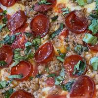 Honeymoon Square · Thin crust Sicilian with fresh mozzarella, pepperoni, sausage, basil and drizzled with mike'...