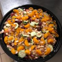 Mandarin Salad · Organic spring mix, grilled chicken, mandarin oranges, cucumbers, almonds, craisins and toma...