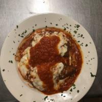 Chicken Parmigiana · Breaded chicken, marinara sauce and mozzarella cheese.