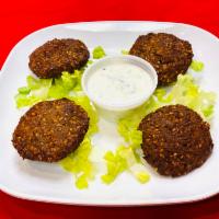 Falafels · Deep-fried chickpeas and traditional spices served with tzatziki sauce and hummus.