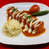 Chicken Beyti · Seasoned ground chicken breast, skewered and charbroiled, wrapped in a thin sheet of dough t...
