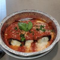 Eggplant Rollatini · Stuffed with Mozzarella cheese and Ricotta and comes with Marinara Sauce