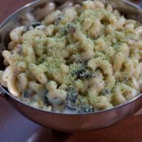 Mac Attack Pasta · Mozzarella, parmesan, cheddar, truffle oil, roasted mushroom, herb breadcrumbs